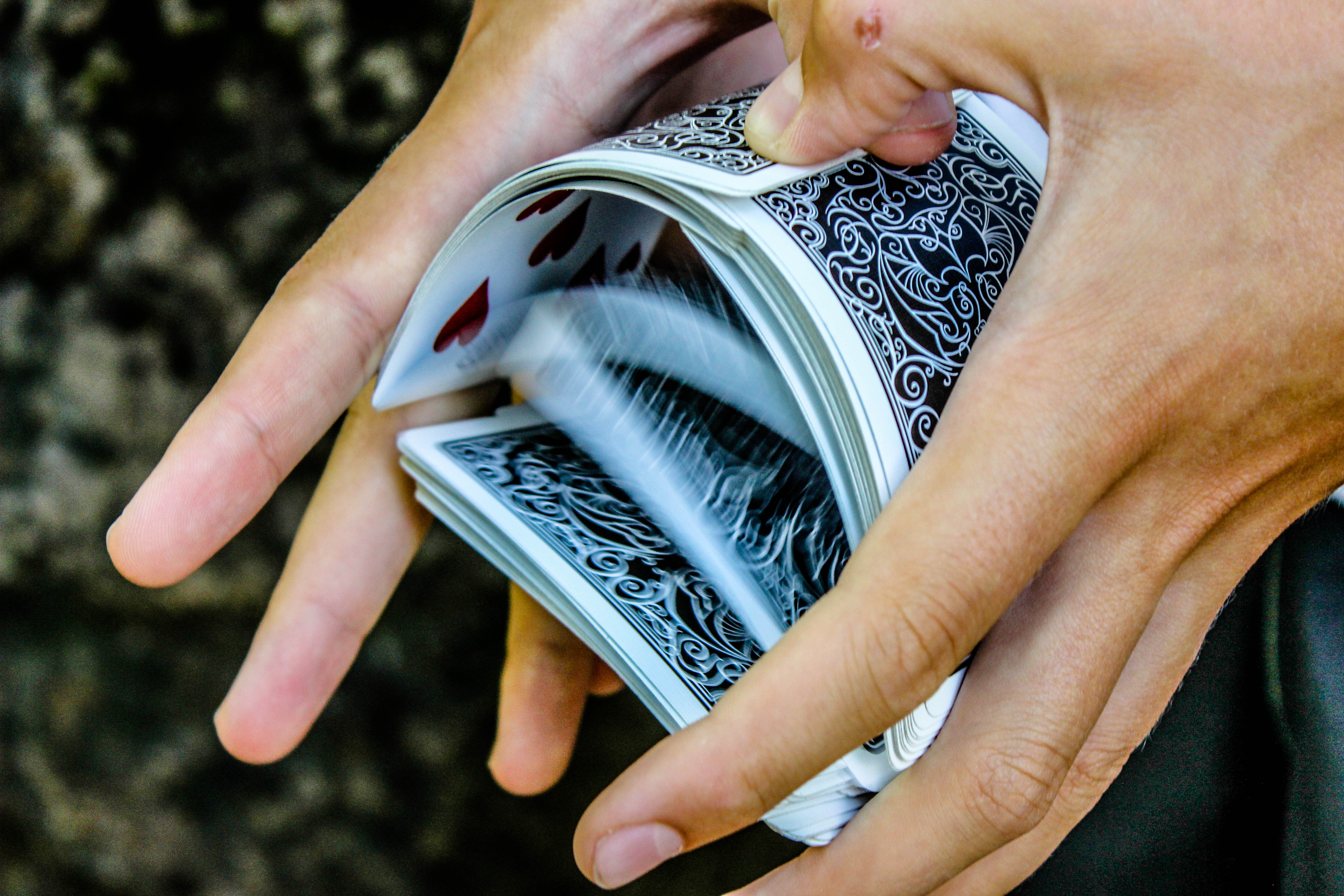 Riffle shuffling a deck of playing cards